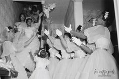 black and white photograph of bridesmaids getting ready for their wedding