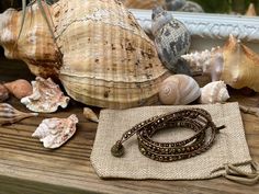 This beautiful wrap bracelets is a mermaid and sea hag favorite all around. Brown leather cording with beautiful and perfectly sized crystal beads with just the right amount of shine, depending on wrist size, should be able to wrap three to four times . The end is adjustable with three latching loops to fit to your size.  Bracelet comes with adorable drawstring bag for storage. Sea Hag, Brown Crystals, Beaded Leather Wraps, Beadwork Bracelet, Key West Fl, Mermaid Jewelry, Bohemian Bracelets, Stackable Bracelets, Wrap Bracelets