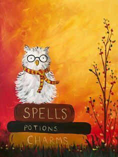 an owl sitting on top of a stack of books with the words spells written above it