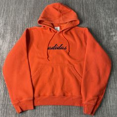 Vintage 2000s Adidas Three Stripes Sportswear Athletic Stitched Embroidered Y2K Aesthetic Streetwear Orange Graphic Hoodie Extra Large Women Condition: Fair Used Condition = Staining Throughout The Sweatshirt Due To Age And Wear  Measurements: Please see photos above for all measurements IF YOU BUY TWO OR MORE ITEMS USE THE CODE BUNDLE @ CHECK TO SAVE 20% WE SHIP WITHIN 24 HOURS AFTER PURCHASE! Please be aware that we do not offer free returns!! The Buyer is responsible for the cost of the return label.  Follow us on TikTok & Instagram @findsnostalgic and tag us in your finds 2000s Adidas, Orange Graphic, Adidas Three Stripes, Aesthetic Streetwear, Vintage 2000s, Y2k Aesthetic, Graphic Hoodie, Graphic Hoodies, Extra Large