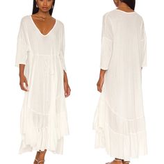 Free People Beach Ivory Sun Seeker Maxi Dress Small New With Tags 100% Cotton The Item Was Taken Out Of Sealed Package To Take Pictures. V- Neck Dolman Sleeves Tie Waist Unlined Round Hem 52" Long From High Point Of Shoulder To Hem Armpit To Armpit 30” Sleeve Length 25” Size: Womens S Condition: New With Tags White Breezy V-neck Midi Dress, White Breezy V-neck Maxi Dress, White Long Sleeve Vacation Dress, Casual White Boho Maxi Dress, White Flowy Midi Beach Dress, White Flowy Midi-length Beach Dress, White Long Sleeve Flowy Beach Dress, Flowy White Beach Dress With Long Sleeves, Off White Maxi Dress For Spring Vacation