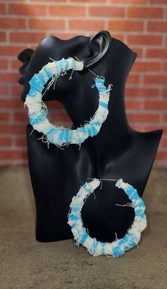 Distressed denim hoop earrings are a true statement piece that will add a pop to your outfit. Ear Rings, Your Outfit, Distressed Denim, Statement Pieces, Hoop Earrings