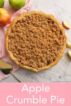 an apple crumble pie on top of a marble counter