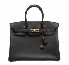 Bag: Hermès Birkin Bag Size: 35cmColor: Noir (Black)Material: Togo Leather Hardware: GoldMeasures: 35x28x18cm (14"x11"x7")Condition : Pristine Includes: Lock, Keys, Clochette, Dustbag, Felt, Raincoat and Orignal Hermès Box with Ribbon Get your hands on this amazing Hermès Birkin and experience what designer handbags are like at their best. This bag is made from exquisite Togo leather and is accentuated with luxurious gold hardware. The beautiful black color makes it easy for you to coordinate th Hermes Birkin 35, Box With Ribbon, Hermes Box, Togo Leather, Hermes Bags, Rarity, Hermes Birkin, Birkin Bag, Hermes Bag Birkin