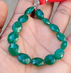 "Lovely Green Onyx Faceted Oval Bead 7\" Inch, 14 Pcs Gems Beautiful Jewelry Gems  HOME PAGE- https://www.etsy.com/in-en/shop/RidhiSidhiBeads?ref=seller-platform-mcnav Gemstone : Green Onyx  Size : 13X10X5 to 11X10X6 MM Shape : Oval Length : 7'' Inches Weight : 66 Cts Pieces : 14 (100% NATURAL GEMSTONE) AAA QualityHigh BeadA Grade BeadLoose BeadsGreen OnyxFaceted BeadsGenuine BeadDrilled BeadSupply BeadNatural StonePolished BeadSemi PreciousFull Strand (YOU WILL GET THE SAME PRODUCT AS YOU SEE I Luxury Green Onyx Round Beads Jewelry, Green Fire, Semi Precious Beads, Onyx Bead, Jewelry Gemstone, Green Onyx, Oval Shape, Semi Precious, Beautiful Jewelry