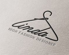 the logo for high fashion designer is shown on top of a piece of white paper