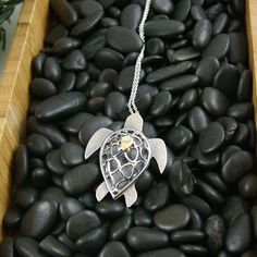 Silver Turtle Pendant, maternity jewelry, statement necklace, Silver turtle necklace, totem jewelry, animal jewelry, big turtle pendant You know totem animals? They exist in many cultures, and have just so many meanings. To me, the turtle is synonym of perseverance and intuition. This one also evokes maternity, with her gold baby turtle on her back. Perseverance The turtle go slowly, but steadily, as she is living a long life. Intuition Just out from the egg shell, the baby turtles already know Maternity Jewelry, Silver Turtle Jewelry Gift, Turtle Necklace Pendants, Silver Turtle Jewelry For Gifts, Silver Turtle Necklace For Gift, Big Turtle, Totem Animals, Handmade Turtle-shaped Sterling Silver Jewelry, Graduation Rings