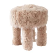 a small stool made out of sheepskins on a white background with no legs