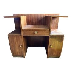 a wooden desk with two drawers on it