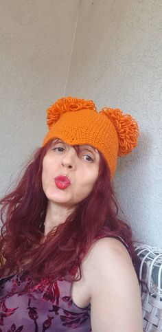 Halloween hat, Orange beanie. Girls hat with two pom poms Crochet Halloween wig made off of gentle yarn Size variations means head circumference. Please contact me about special requests