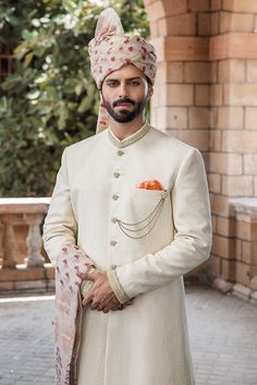 Shervani Design For Men Simple, Traditional Cream Sherwani For Groom, Traditional Cream Bandhgala For Groom, Groom Wedding Dress Pakistani, Traditional White Bandhgala For Wedding, Cream Sherwani For Groom At Eid, Cream Sherwani For Groom Eid Festival, Cream Sherwani For Groom Eid Celebration, Cream Naqshi Sherwani For Groom