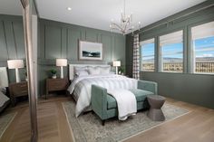 a bedroom with green walls and white bedding in the center, along with two lamps on either side of the bed