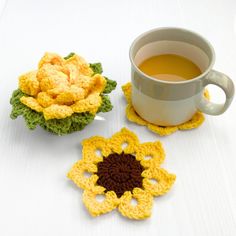 two crocheted coasters and a cup of tea