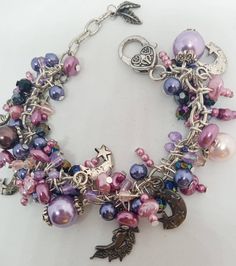 Mix of purples, slivers and pink beads with moon charms Whimsical Purple Beaded Jewelry, Whimsical Handmade Purple Bracelets, Purple Night, Moon Charm, Pink Beads, Charm Bracelets, United Kingdom, Charms, Charm Bracelet