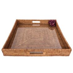 an empty wicker tray with a rose on it