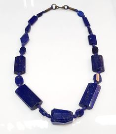 It's very high Quality of Lapis lazuli Stone From Afghanistan Its Handmade Carved Beautiful Beads Necklace Stone Lapis lazuli Stone Length 50Cm Luxury Blue Gemstone Bead Necklaces, Luxury Blue Gemstone Beaded Necklaces, Luxury Blue Beaded Necklaces With Gemstone Beads, Luxury Blue Polished Beads Necklace, Luxury Blue Gemstone Beaded Necklace, Luxury Blue Beaded Necklace With Polished Beads, Blue Lapis Lazuli Necklace With Large Beads, Blue Lapis Lazuli Jewelry With Large Beads, Blue Faceted Lapis Lazuli Beaded Necklaces