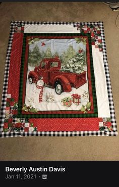 a quilted christmas table runner with an old red truck