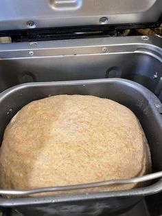 a loaf of bread in a metal pan