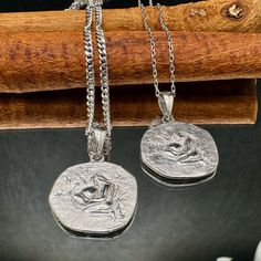 Sterling Silver Round Zodiac Necklace, Aquarius Necklace, Coin Aquarius Pendant Each detail of this pendant is meticulously designed and handcrafted, made from authentic 925 sterling silver to ensure durability that will last for years. For a variety of selection , please visit our shop at:  https://www.etsy.com/shop/NNGJewellery?section_id=46100386 Aquarius Pendant is not allergic and does not contain nickel. Material: 925 ct silver Weight: 2.1 gr Size:  17 mm x 17 mm. They will come with a gift box. All orders will be shipped out within 1-2 business days after receiving the order. Shipping: Standard Shipping usually takes 2-4 Business days to the USA, 3-7 days to Canada, and 7-15 Business days to Europe and Australia.  Please message us for any more information! We reply quickly :) Pleas Mythological Medallion Jewelry Gift, Mythological Round Pendant Necklace For Gifts, Mythological Round Pendant Jewelry As Gift, Mythological Pendant Necklaces As Gifts, Mythological Style Round Jewelry Gift, Silver Mythological Necklace For Gift, Handmade Silver Mythological Necklace, Silver Handmade Mythological Necklace, Mythological Style Silver Necklace For Gift