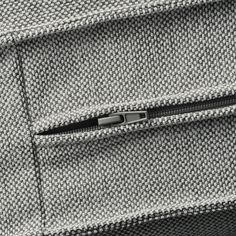 a close up view of the zipper on a jacket