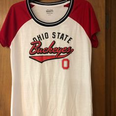 Women’s Ohio State T-Shirt Red College Tops With Logo Print, Casual Red Tops For Game Day, University Red Varsity Tops With Letter Print, Red Short Sleeve Top For College, University Red Collegiate Short Sleeve Top, Varsity Style Red Top With Graphic Print, White Casual Game Day Top, Red Varsity Top With Graphic Print, Casual University Red Tops With Logo Print