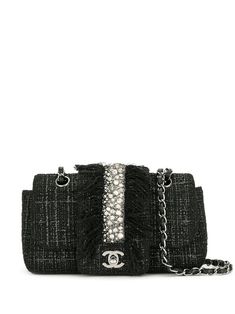 circa 2006 black wool rhinestone fringe signature interlocking CC logo twist-lock signature double flap closure leather and chain-link shoulder strap Please be mindful that this piece has led a previous life, and may tell its story through minor imperfection. Beautiful Museum, Rhinestone Fringe, Chanel Tweed, Classic Flap Bag, Shopping Chanel, Black Tweed, Chanel Vintage, Chanel Black, Classic Flap