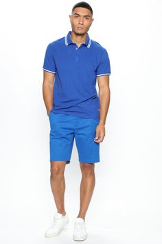 Available In Black, White, Grey, Pink, Red, Navy, Neon Pink, Neon Yellow, Green, Yellow, Light Blue, Coral And Royal Blue Fold Down Collar 3 Button Closure Short Sleeve 100% Cotton Imported | Mens Wilson Short Sleeve Polo in Royal size Medium by Fashion Nova Blue Relaxed Fit Short Sleeve Polo Shirt, Functional Blue Short Sleeve Polo Shirt, Sporty Team-colored Short Sleeve Polo Shirt, Blue Moisture-wicking Casual Polo Shirt, Blue Short Sleeve Polo Shirt With 4-way Stretch, Mens Flannel, Button Down Shirt Mens, Cargo Pants Men, Short Sleeve Polo