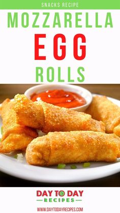 egg rolls on a plate with dipping sauce