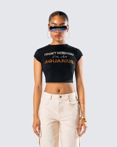 We love an independent baddie 💅 Let them know the vibes in this black top made from stretch jersey fabric and complete with a rhinestone “I Don't Need You I’m An Aquarius” graphic ✨🖤 Y2k Letter Print Tops For Night Out, Y2k Style Tops With Letter Print For Night Out, Y2k Tops With Letter Print For Night Out, Black Slogan Crop Top For Summer, Y2k Black T-shirt For Night Out, Graphic Tee With Letter Print For Night Out, Hip Hop Black Top With Graphic Print, Y2k Black Crop Top With Slogan, Black Fitted Crop Top With Slogan