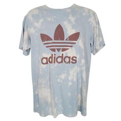 Adidas reworked bleach tie dye blue white extra large logo t-shirt  size medium Please look at Measurements, brand sizes can vary immensely Measurements Chest 44 Length 29   Fabric is cotton. made in Peru All pre owned clothing is laundered before being shipped this is a sweet reworked Adidas tee that has large graphic logos on the front and back. great classic retro skater casual streetwear Top is pre owned and in good condition. there are some small holes on the garment as shown. otherwise a great piece. Acid Wash Logo Print T-shirt For Summer, Acid Wash T-shirt With Logo Print For Summer, Summer Acid Wash T-shirt With Logo Print, Bleached Blue Tops For Streetwear, Sporty Acid Wash T-shirt For Summer, Sporty Tie-dye Cotton T-shirt, Sporty Tie Dye T-shirt With Crew Neck, Sporty Tie-dye T-shirt With Crew Neck, Blue Bleached Graphic Tee