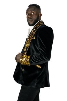 This mens velvet smoking jacket exudes a certain sophistication that other jackets can only dream of. We have taken this perfectly tailored, double breasted blazer to the next level with the addition of gold and black flip sequins. FEATURES: Double breasted Fully lined with satin 4 pockets including 1 inside breast pocket Reversible gold and black sequin contrast collar, cuffs and trim Velvet trimmed collar to for ultimate comfort Ethically made in-house in our studio & 100% carbon neutral Slim Carbon Neutral, Velvet Trim, Contrast Collar, Gold Sequins, Breasted Blazer, Double Breasted Blazer, Black Sequins, Festival Wear, Double Breasted