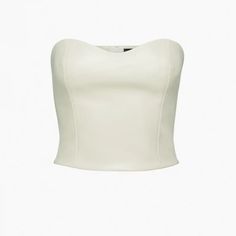 Ten By Babaton Cindy Bustier (Vegan Leather)(Birch) This Is A Strapless Bustier Top With A Sweetheart Neckline And Princess Seams For Shaping. It’s Made With Our Premium Stretch Vegan Leather From Japan, Crafted For Superior Shape Retention, Easy Care And An Authentic Look And Feel. Fit: Tight A Close Fit That Hugs The Body Length: Waist Intended To Hit Between The Waist And High Hip Bust 33 In Waist 25 In Materials & Care Origin: Fabric From Japan Content: 100% Polyurethane; Interior: 100% Nylo Elegant Sleeveless Cream Crop Top, Elegant Crop Top With Boned Bodice, Chic Cream Crop Top, Chic Cropped Tube Top With Boned Bodice, Fitted Beige Top With Boned Bodice, Elegant Beige Bandeau Top, Elegant Cream Crop Top, Elegant Beige Corset For Night Out, Chic Boned Bodice Tube Top