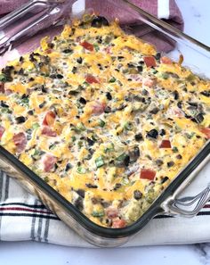 a casserole dish is sitting on a towel