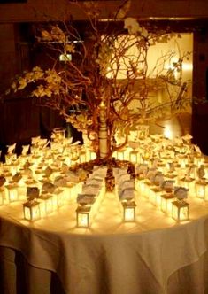 the table is covered with many small lanterns