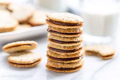 a stack of cookies with chocolate on top