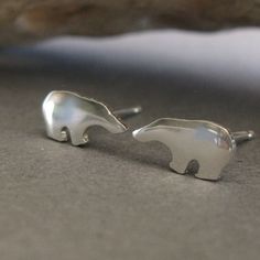 The tiniest little polar bears to adorn your ears. The Details ∞ Artisan handmade ∞ Tiny polar bear studs (approx 9mm x 4.5mm) ∞ Choose from sterling silver, 14k gold-filled or solid 14k yellow gold ∞ Earring backs included in the metal of your choice ∞ Made to order ∞ Gift box included ∞ Made in the USA Is 14k gold-filled right for you? If you are purchasing our gold filled stud earrings please keep in mind they are cut from a sheet of 14k gold filled metal. The front and back of the stud will Cute Stud Earrings, Gold Bond, Tiny Studs, Tiny Stud Earrings, Polar Bears, Gold Filled Earrings, Gold Earring, Antique Earrings, Yellow Gold Earring