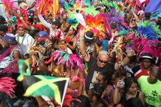 a large group of people in colorful costumes