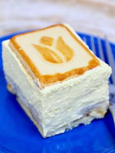 a piece of cake sitting on top of a blue plate