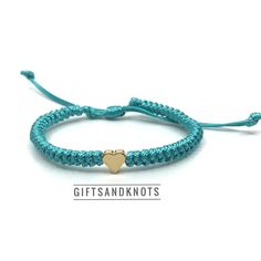 "This braided bracelet is an expression of freedom, uniqueness, and simplicity. The bracelet is made of waterproof linhasita cord and gold plated hearts. Designed for everyday wear. The bracelet has an adjustable closure. The woman size bracelet closes around 6\". The girl size bracelet closes around 4.5\"." Braided Bracelet, Cord Bracelets, Braided Bracelets, Sea Green, Heart Bracelet, Heart Charm, Arm Band, Rope Bracelet, Friendship Bracelets