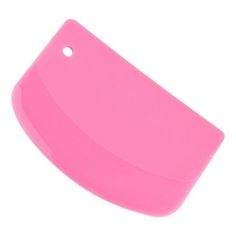 a pink plastic cutting board on a white background