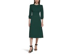 Calvin Klein Scuba Crepe 3/4 Sleeve Puff Sleeve Midi - Women's Dress : Malachite : The primary materials that compose this product contain a minimum of 20 percent recycled content. Add elegance to your look and stand out from the crowd wearing Calvin Klein Scuba Crepe 3/4 Sleeve Puff Sleeve Midi Dress. Crafted with scuba crepe fabric, the A-line dress features a round neck, three-fourth puff sleeves, back zipper closure, and a knee-length silhouette. 66% polyester, 30% recycled polyester, 4% spandex. Dry clean only. Imported. Calvin Klein Midi Dress For Fall Workwear, Basic Dresses, Puff Sleeve Midi Dress, Top Backpacks, Basic Dress, Sleeve Midi Dress, Calvin Klein Woman, Crepe Fabric, Womens Midi Dresses