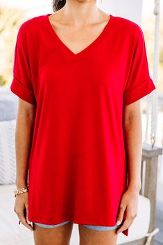 This versatile v-neck tee is here to make your life easy! It's honestly the perfect top for year round styling and layering. You can knot the hem or half tuck into your favorite jeans or shorts. You can layer it with all sorts of jackets, shackets, or kimonos. And don't even get us started on accessories! The options are absolutely endless! This top is truly a staple piece! This top features a v neckline, short cuffed sleeves, and a generous fit.Material has generous amount of stretch. Sydney is Red Relaxed Fit V-neck T-shirt, Red T-shirt For Summer Loungewear, Solid Color V-neck T-shirt For Day Out, Solid V-neck T-shirt For Day Out, V-neck T-shirt For Day Out, Red V-neck Top For Day Out, Mint Julep Boutique, Mint Julep, Staple Pieces