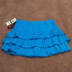 Girls’ Ruffled Skirt, Elastic Waistband, Aqua Blue, Size Large, New W/Tags. Adorable!! Blue Stretch Ruffle Skort, Blue Ruffled Stretch Skort, Cute Ruffled Skirt For School, School Skirt With Ruffles In Cotton, School Skirt With Cotton Ruffles, Summer Tiered Skirt For School, School Tiered Skirt With Ruffles, Summer School Tiered Skirt, Casual Ruffled Skirt For School