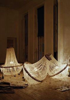 an image of a room that has been decorated with lights on the floor and in front of it