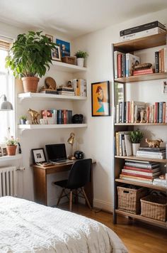 a bed room with a neatly made bed and lots of books on the shelves above it