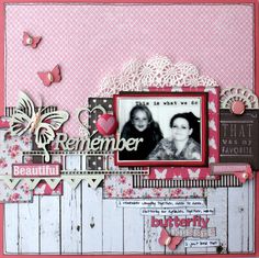 a scrapbook page with an image of two women and butterflies on the cover, in pink