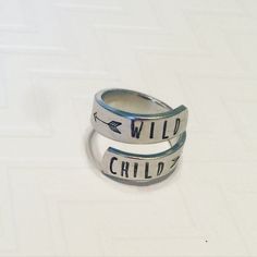 Adjustable wrapped aluminum ring that can be customized with names, words, or a short saying up to 30 characters. This makes a great mother's ring or couple's ring 💕 They are adjustable which makes them great for gift giving. Select your ring size or a common size is 7.5 and can be easily squeezed or expanded to fit the recipient. If you don't see your size let me know! Message me with any questions! Thank you for looking 💕 https://www.etsy.com/shop/TristarCustomDesigns?ref=hdr_shop_menu *I ha Personalized Adjustable Symbolic Rings, Adjustable Personalized Symbolic Rings, Adjustable Symbolic Personalized Rings, Inspirational Adjustable Hand Stamped Rings, Meaningful Adjustable Rings With Custom Name, Adjustable Themed Silver Rings, Adjustable Silver Engraved Ring With Names, Meaningful Customizable Adjustable Rings, Customizable Adjustable Silver Engraved Ring