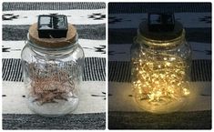 two mason jars with lights in them sitting on a tablecloth next to each other