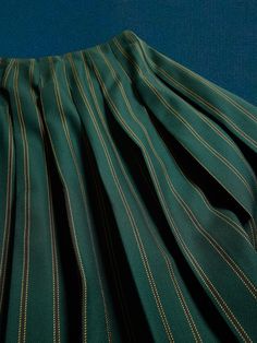 Crafted in a beautiful Italian wool, this pleated wool skirt brings the timeless tailoring of traditional tartan styles, with a leather strap closure at the side and mixed patterns for added edge that begs for a layered approach.  RELAXED FIT: Cut wi Classic Pleated School Skirt, Classic Green Pleated Skirt, Elegant School Pleated Skirt With Lining, Formal Green Pleated Skirt, Mixed Patterns, Wool Skirt, Wool Skirts, Pattern Mixing, Tartan