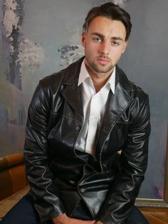 "This black faux leather German vintage jacket has a not collar and closes in the front with four buttons. The handsome high-quality jacket has two pockets on the front and is lined in a black satin polyester fabric. Brand label: InScene (Germany) Size: 42 US/UK Material: 65% PVC, 30% polyester, 5% polyurethane --- M E A S U R E M E N T S --- Chest = 44 inches (111.76cm)(the extra 2 inches here allow for what you wear under and for ease of movement; this is a best fit for a 42\" chest, or Size 4 Classic Black Biker Jacket With Button Closure, Classic Black Leather Jacket With Button Closure, Classic Black Biker Jacket With Snap Buttons, Classic Black Formal Biker Jacket, Formal Single Breasted Leather Jacket, Formal Single-breasted Button-up Leather Jacket, Formal Single-breasted Leather Jacket, Classic Black Leather Jacket With Double Button Closure, Classic Fitted Biker Jacket With Buttons